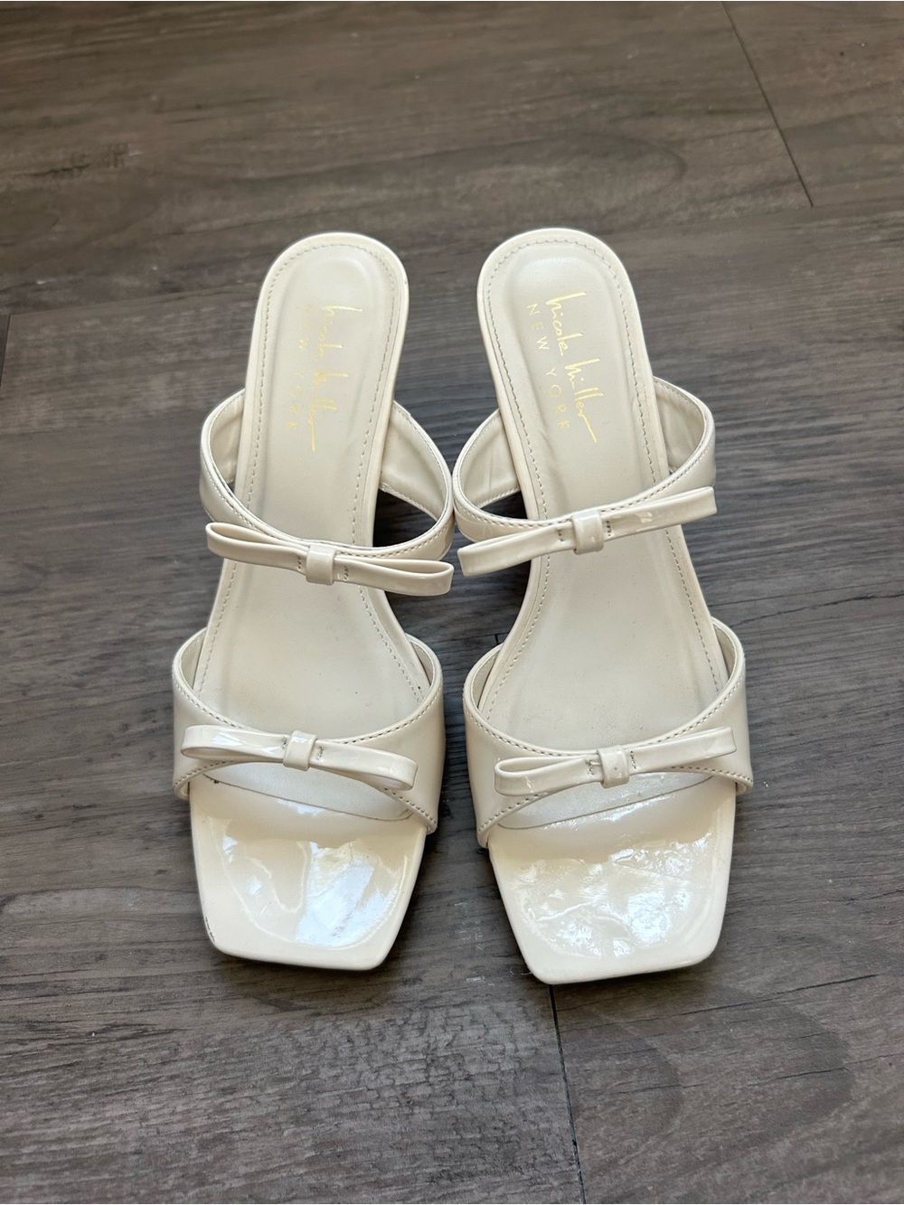 Nicole Miller Ivory Patent Double-Bow Slide Heels